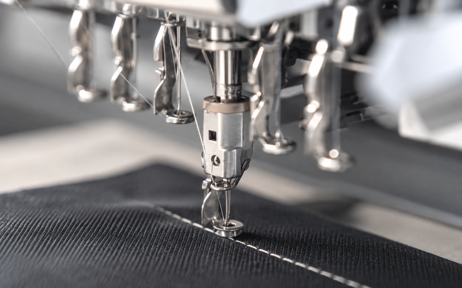 Master tailor hand-shaping bespoke floating canvas jacket at SARTO Toronto atelier